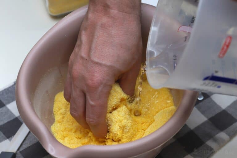 adding water to cornmeal