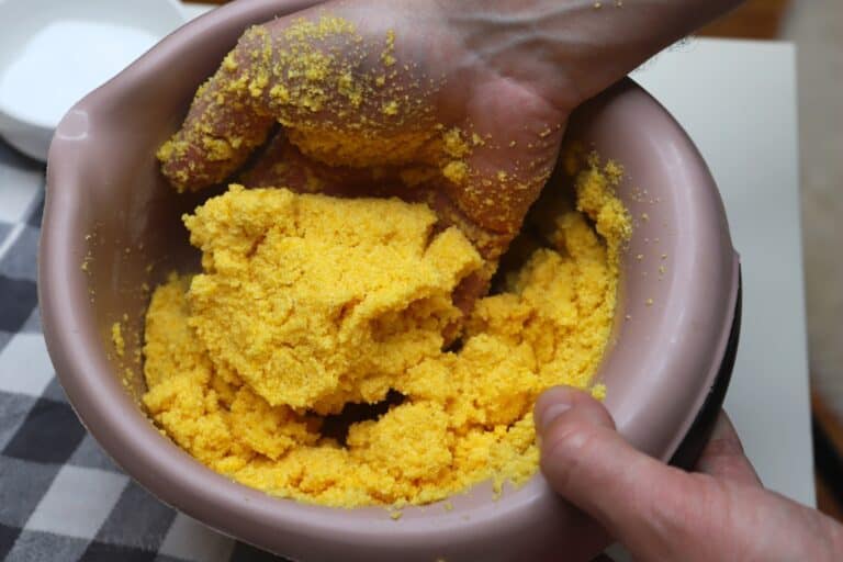 mixing cornmeal and water