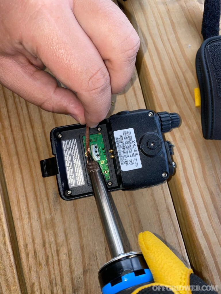  Use your heated soldering iron and soldering wick to loosen and remove the jumpers.