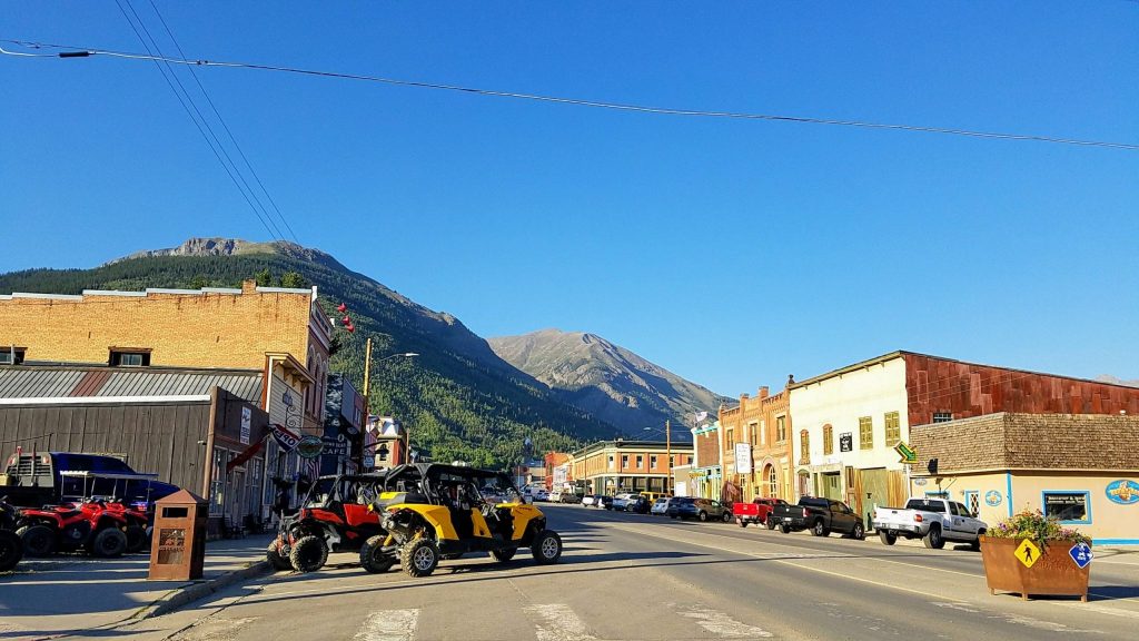 Main street in Silverton Colorado with mountain backdrop