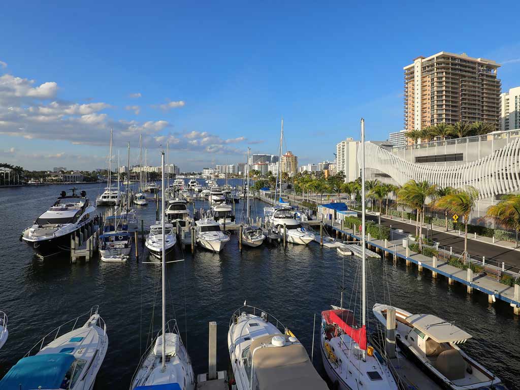 A photo of docked boats on the Intracoastal Waterway in Fort Lauderdale, near the East Las Olas Boulevard Bridge, the area is home to many restaurants, some of which will cook your catch.