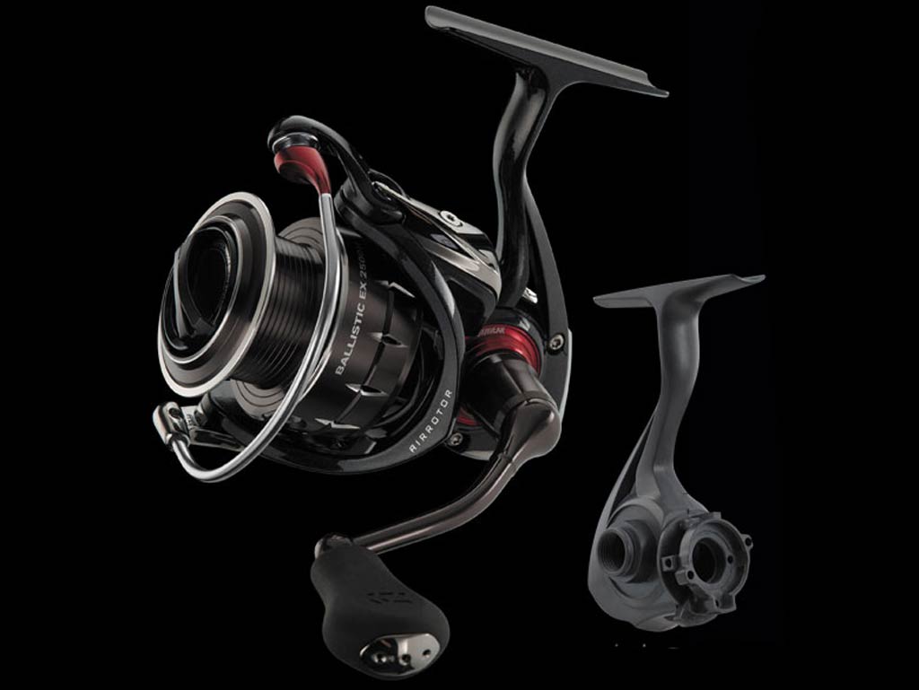 A closeup of a Daiwa Ballistic reel against a black background, versatile enough to be used for saltwater and freshwater fishing