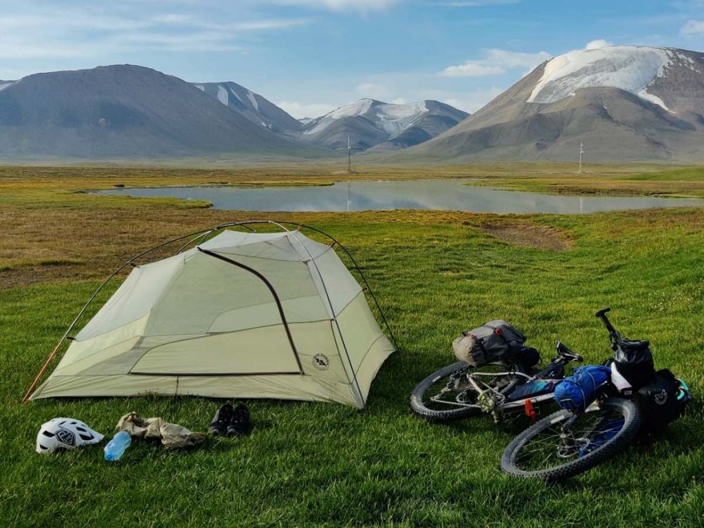 Bikepacking Tents: Big Agnes Copper Spur HV UL3 bikepacking tent in high valley in Kyrgyzstan