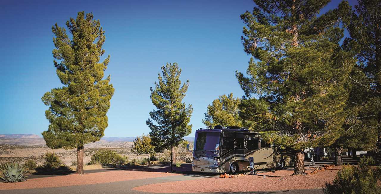 Motorhome in in a campground with beautiful vista.