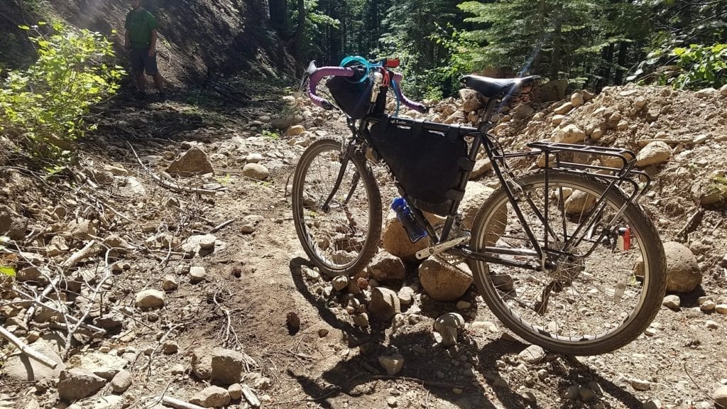 Touring bike on extremely rocky dirt road