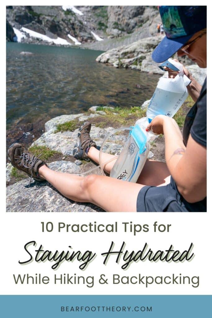 Woman filtering water at a mountain lake. Text reads: 10 Practical tips for staying hydrated while hiking and backpacking