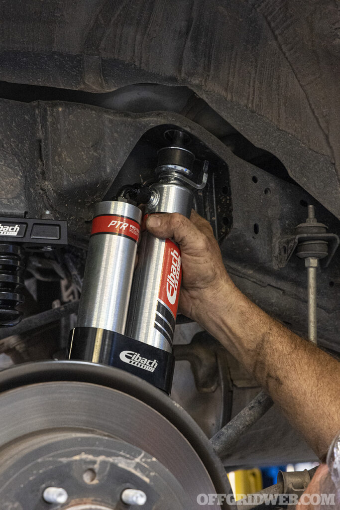 Suspension parts being installed on a toyota 4runner.