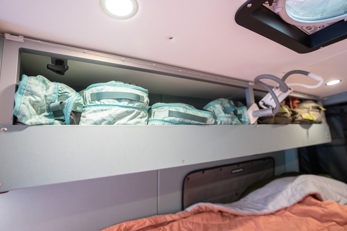 Packing cubes with clothing in a camper van