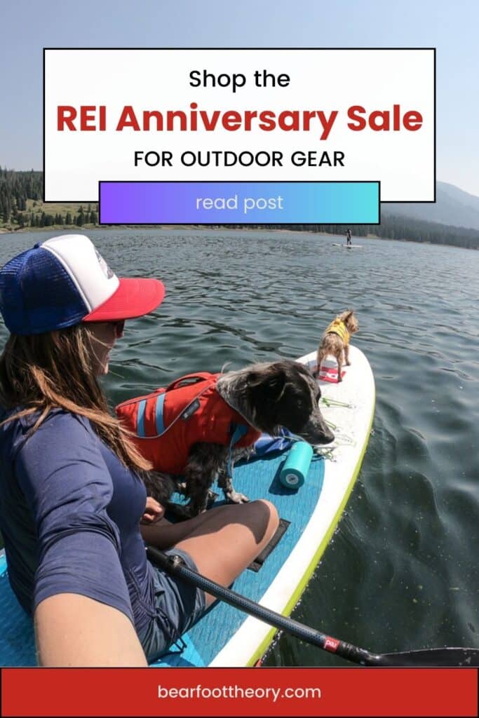 Kristen Bor on a paddle board with two dogs with text that says "Shop the REI Anniversary Sale for Outdoor Gear"