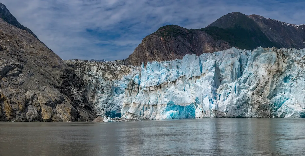 Glacier Collapses in Front of Tour Boat—Watch What Happens